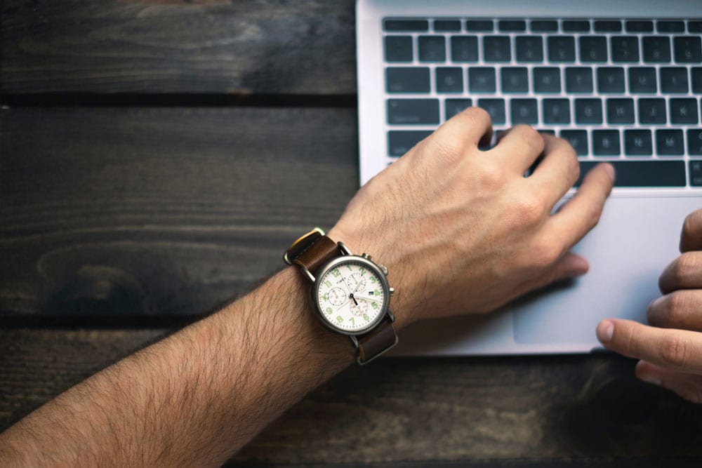 Photo of a man working on a computer