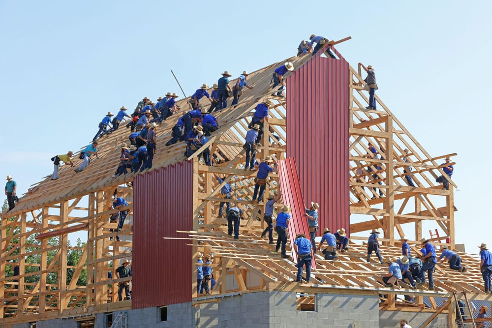 A team of people building a house together